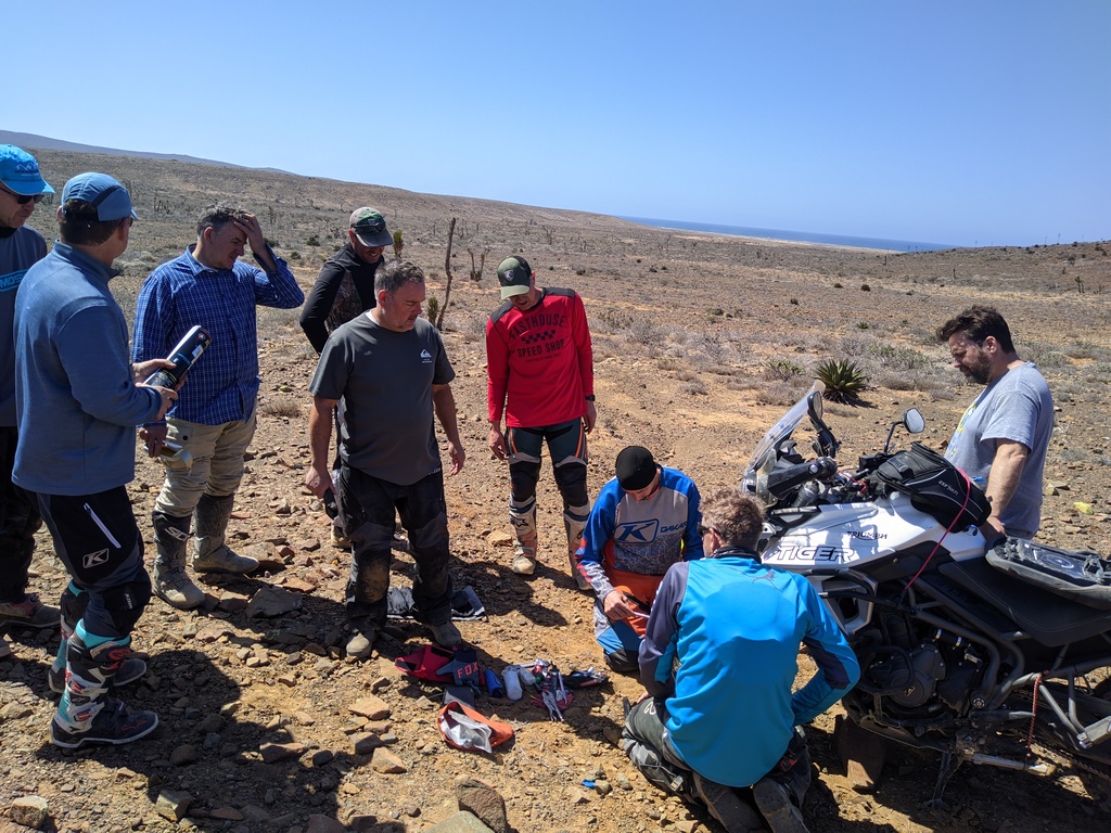 how many moto riders does it take to fix a flat tire? of course they didn&rsquo;t bring the wrench to take the wheel off&hellip;